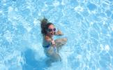 cheerful-girl-pool-smiling-showing-thumbs-up_72594-694.jpg