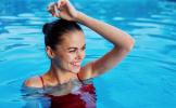 pretty-woman-red-swimsuit-hands-head-relaxation.jpg